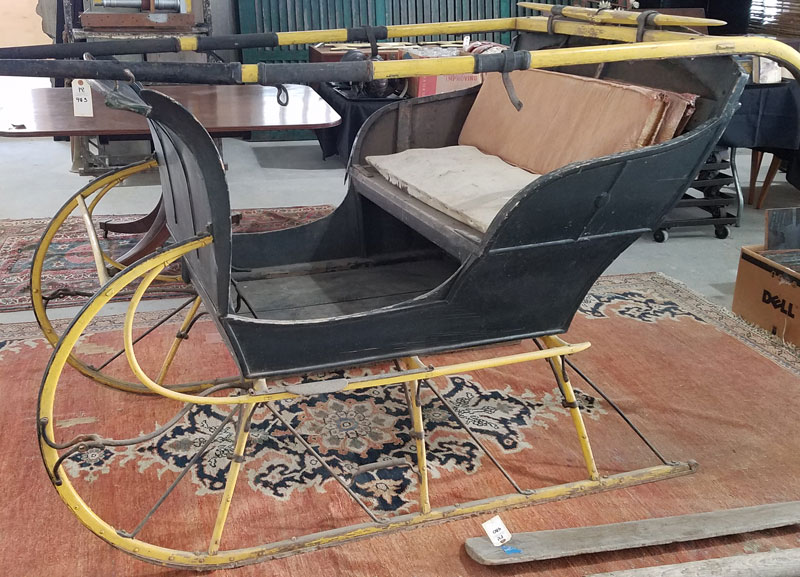 Horse-drawn sleigh from Chatham, NY owned by Vincent Mulford in showroom of Public Sale auction house in Hudson, NY.