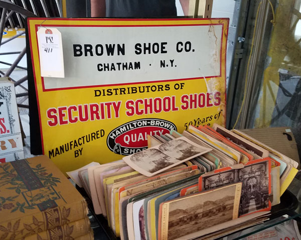 Vintage advertising sign of shoe company in Chatham, NY from Vincent Mulford collection up for auction at Public Sale auction house in Hudson, NY.