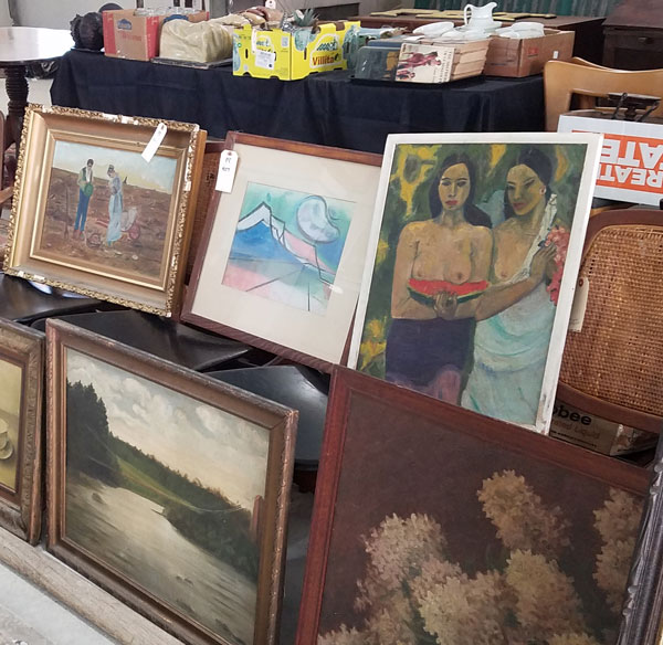 Vintage paintings from Vincent Mulford store as items for debut auction at Public Sale auction house in Hudson, NY.