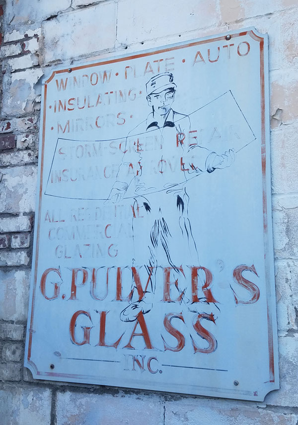 Vintage advertising sign of Pulver's Glass in Hudson, NY.