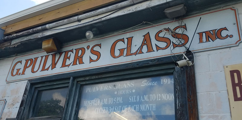 Vintage advertising sign of Pulver's Glass at 90 Green St. in Hudson, NY.