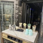 The white terrazzo floor is new, but if you would like to see a sample of the original terrazzo floor, there’s still a small square by the vault, now a wine cooler.