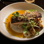 Faroe Island Salmon, roasted cauliflower, Calabrian chilis, pine nuts
